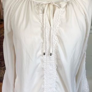 Loose creamy blouse